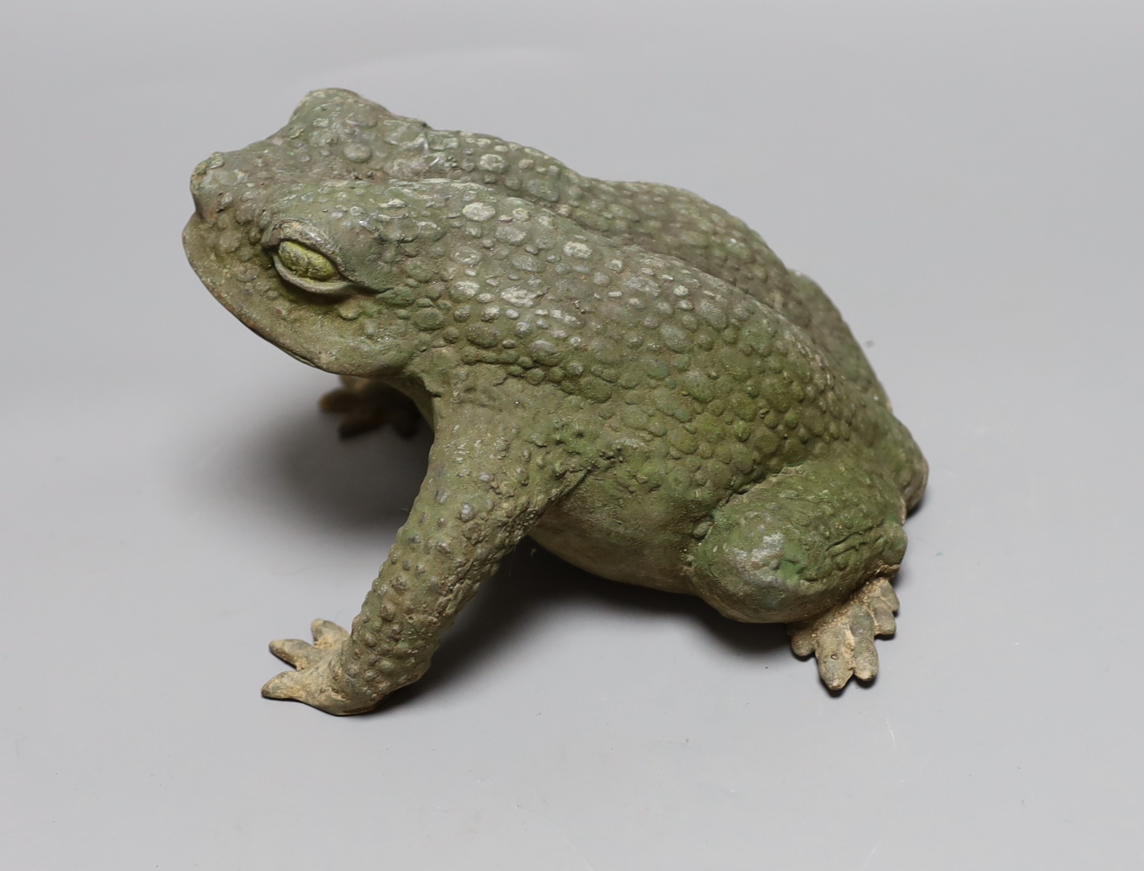 A Japanese bronze model of a toad, 25cms long